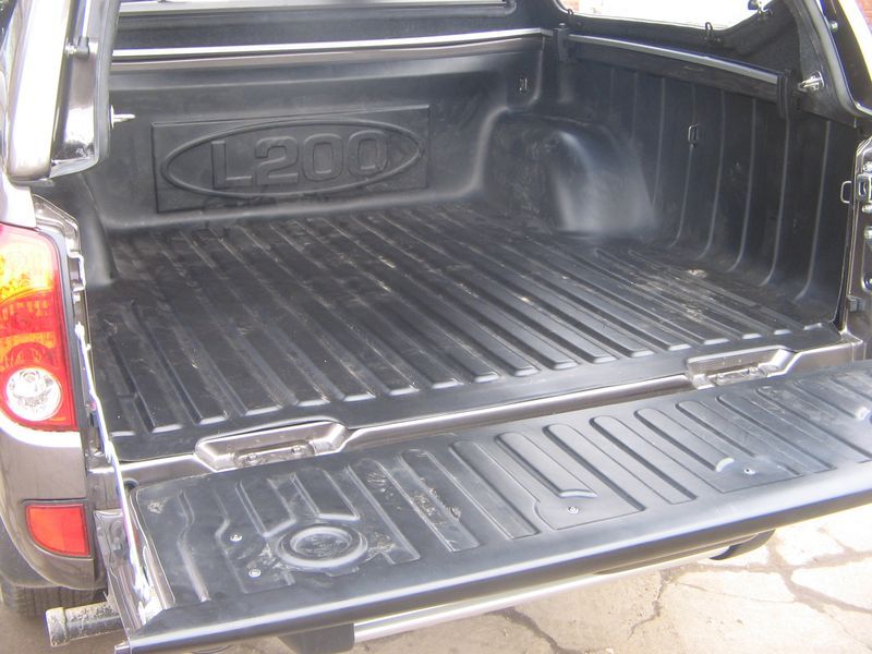 Вставка в кузов пикапа Mitsubishi L200 (Triton)