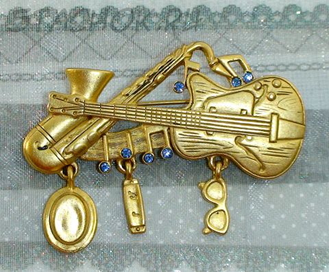Брошь "Джаз бэнд" под античное золото/стразы