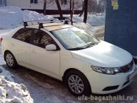 Багажник на крышу Kia Cerato TD 2009-2013, Атлант, аэродинамические дуги