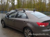 Багажник на крышу Kia Cerato TD 2009-2013, Атлант, прямоугольные дуги