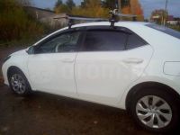 Багажник на крышу Toyota Corolla с 2013 г, Атлант: аэродинамические дуги и опоры типа Е