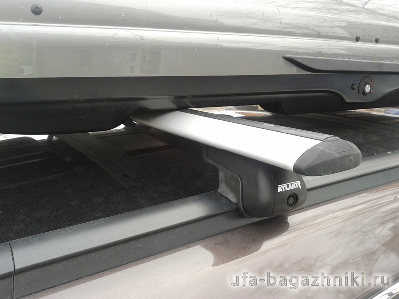 Багажник на крышу Hyundai Santa Fe 2012-..., крыловидные дуги на интегрированные рейлинги, Атлант