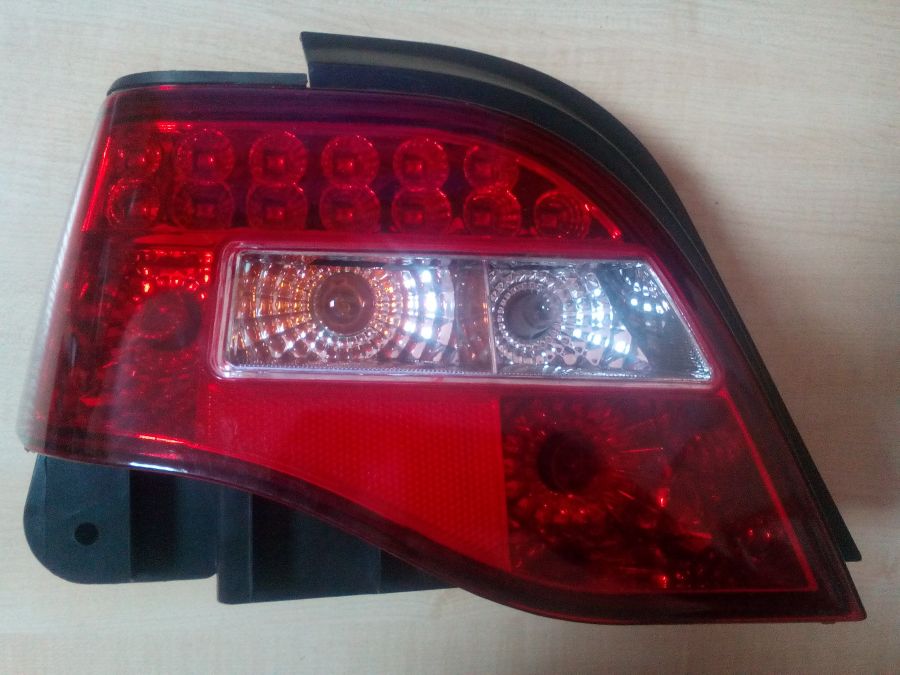 Фонарь задний левый DAEWOO Nexia '08- тюнинг диодный (маленький скол на углу) ST2221920DP Sat