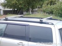 Багажник на крышу Subaru Forester SF 1997-2002, Атлант, аэродинамические дуги на рейлинги