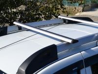 Багажник на крышу Renault Duster 2, Атлант, крыловидные дуги на рейлинги