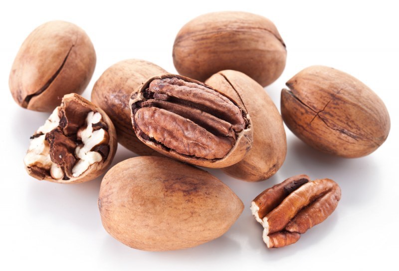 Пекан орех в скорлупе