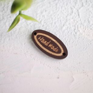 Деревянная пуговица овальная Hand made коричневая 27*13 мм.