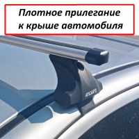 Багажник на крышу Kia Rio (c 2017г, sedan), Атлант, аэродинамические дуги Эконом, опора Е