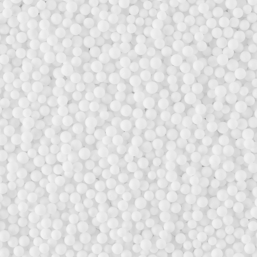 Белые мелкие пенопластовые шарики