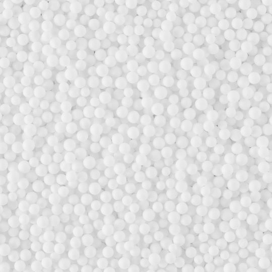 Белые мелкие пенопластовые шарики