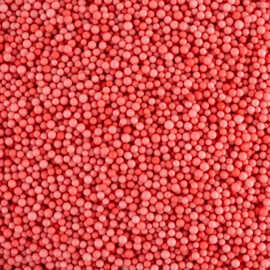 Красные мелкие пенопластовые шарики