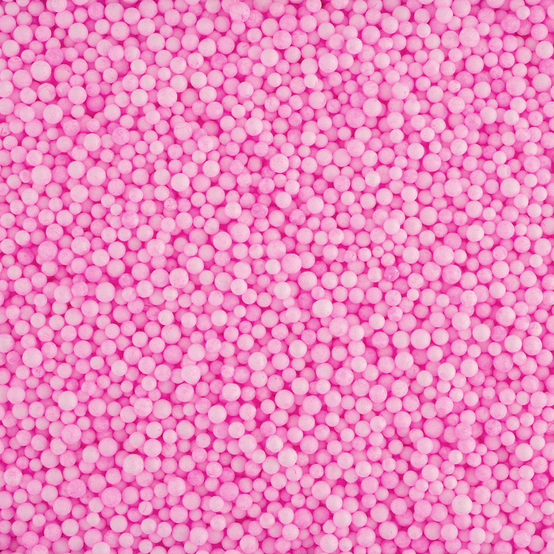 Розовые мелкие пенопластовые шарики