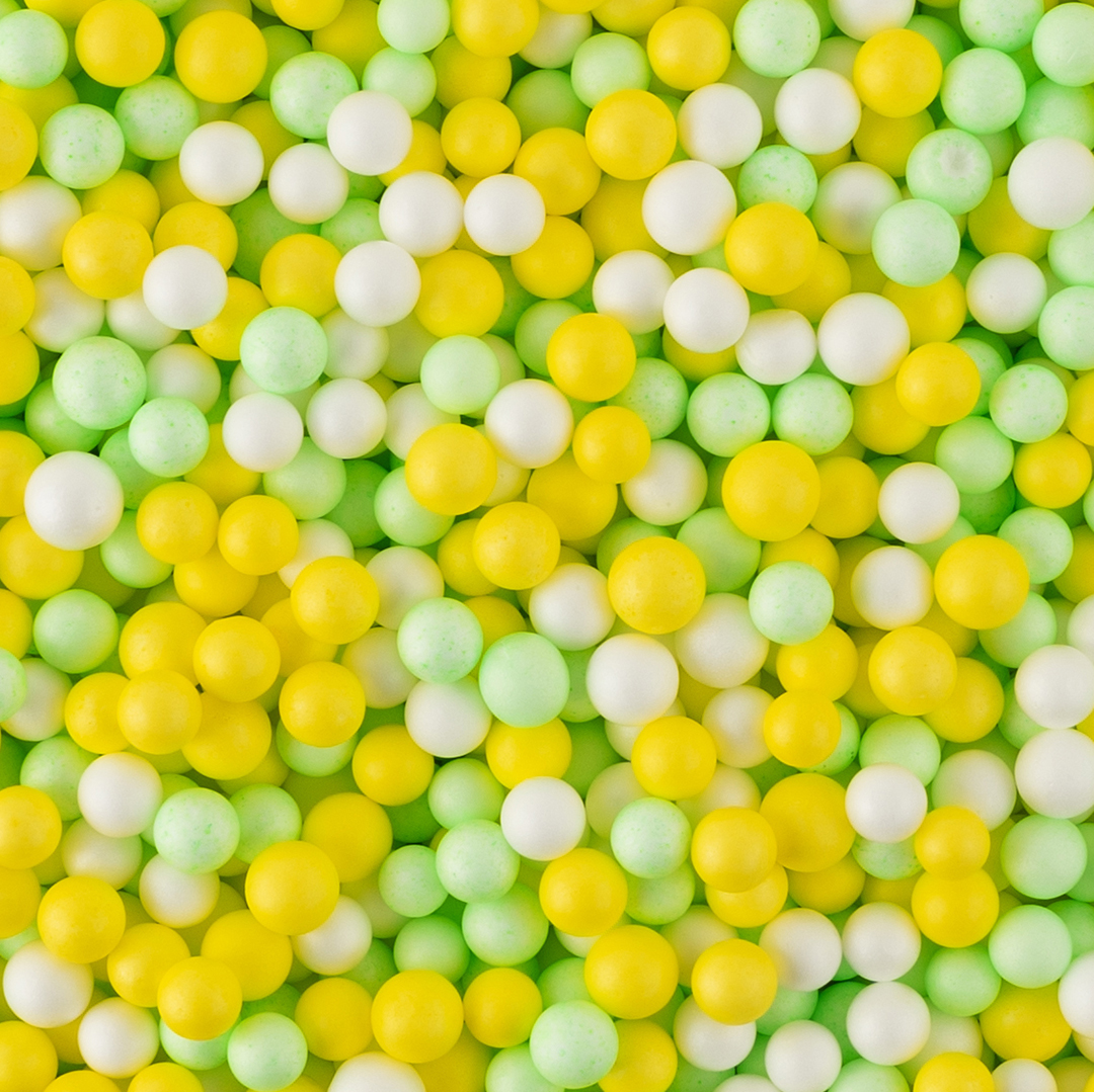 Желто-зеленые крупные пенопластовые шарики