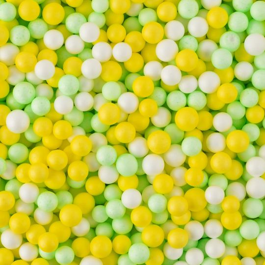 Желто-зеленые крупные пенопластовые шарики