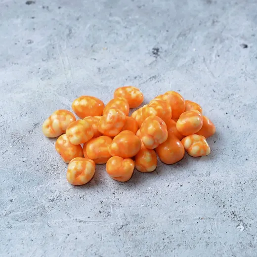 Ананас "Tropicana" драже в шоколадной глазури Ананас "Tropicana" драже в шоколадной глазури