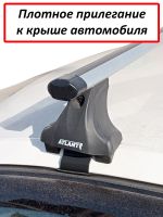 Багажник на крышу Skoda Octavia A8, Атлант, аэродинамические дуги Эконом, опора Е