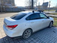 Багажник на крышу Nissan Almera (G15) 2012-18, ЕД, черные крыловидные дуги